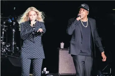  ?? — MATT ROURKE/THE ASSOCIATED PRESS/FILES ?? The powerful music couple of Beyonce and Jay-Z comes to B.C. Place on Oct. 2 at 6 p.m. The duo released their debut under the name The Carters in June. Titled Everything is Love, it completes a trilogy of albums.