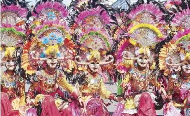  ??  ?? Masskara Festival dancers of Bacolod, Negros Occidental.