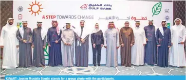  ?? ?? KUWAIT: Jassim Mustafa Boodai stands for a group photo with the participan­ts.