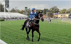  ?? GETTY IMAGES ?? Hugh Bowman on Winx returns to scale after winning The Winx Stakes at Royal Randwick Racecourse in Sydney on Saturday.