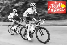  ?? - AFP photo ?? Great Britain’s Geraint Thomas (R) wearing the overall leader’s yellow jersey and Spain’s Mikel Landa ride during the 203,5 km second stage of the 104th edition of the Tour de France cycling race on July 2, 2017 between Dusseldorf, Germany and Liege,...