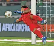  ?? ?? South Africa’s Ronwen Williams saves a penalty in the shootout against Cape Verde on Saturday