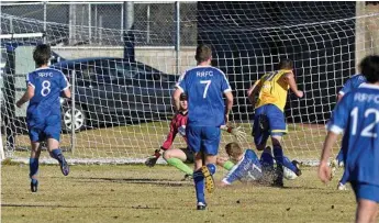  ?? Photo: Kevin Farmer ?? GOAL: USQ FC’s Aaron Wieden scores the opening goal in his side’s Toowoomba Football League premier men’s game against Rockville.