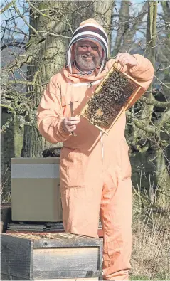  ?? Picture: Angus Findlay. ?? Gavin Ramsay with his hives in Perthshire.