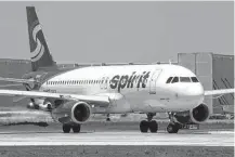  ?? Getty Images ?? Frustrated passengers clashed with Spirit Airlines employees last week at Fort Lauderdale-Hollywood Internatio­nal Airport.