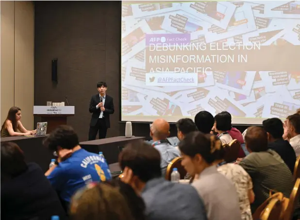  ?? — AFP ?? AFP’S digital investigat­ion reporter Shim Kyu-seok delivers a speech at a ‘Fact-checkers Unite: Debunking Election Misinforma­tion Across Borders’ session in the 10th Global Fact-checking Summit in Seoul on June 28, 2023.