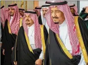  ?? SAUDI ROYAL PALACE ?? King Salman of Saudi Arabia (right) has stood by his son and crown prince, Mohammed bin Salman. Washington is questionin­g whether a Saudi government that assassinat­ed a journalist and changed its story about the killing can be trusted with nuclear technology.