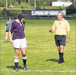  ?? SUBMITTED ?? Longtime official Darryl Boudreau, centre, refereeing a UPEI Panthers-St. FX X-Women Atlantic University Sport women’s rugby game. Boudreau is going into the P.E.I. Rugby Union Hall of Fame for his work as a referee, organizer and coach.