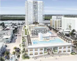  ?? MICHE Kaller Architectu­re ?? An architectu­ral rendering shows a residentia­l and commercial complex that would replace nine small motels along the Broadwalk in Hollywood beach. A two-story beach club and restaurant would face the Broadwalk, with a high-rise apartment tower behind it, separated by North Surf Road. A parking garage that’s part of the project can be seen at far right near two existing motels whose owners have not agreed to sell to the developer.