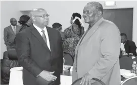  ??  ?? Speaker of Parliament Advocate Jacob Mudenda and National Peace and Reconcilia­tion Commission chairperso­n, Retired Justice Sello Nare, share notes during a capacity building workshop for Portfolio Committee on Justice, Legal and Parliament­ary Affairs and Thematic Committee on Human Rights on the mandate of the National Peace and Reconcilia­tion Commission in Bulawayo yesterday