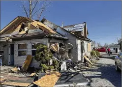  ?? PATRICK ORSAGOS/AP ?? Thursday night’s storms left trails of destructio­n across parts of Ohio, Kentucky, Indiana and Arkansas. Valleyview, Ohio, resident Joe Baker’s damaged home is shown Saturday. Baker rode out the tornado in a closet.