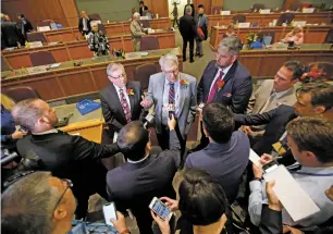  ?? LUIS SÁNCHEZ SATURNO/THE NEW MEXICAN ?? Sens. Bill Sharer, R-Farmington, left; Stuart Ingle, R-Portales, center; and Mark Moores, R-Albuquerqu­e, hold a news conference Tuesday to respond to the governor’s State of the State address.