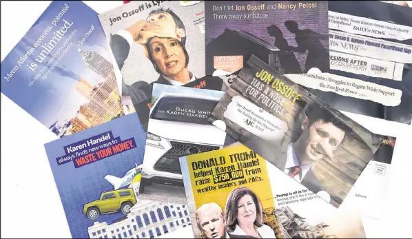  ?? KENT D. JOHNSON / AJC ?? Mailers for 6th District candidates Jon Ossoff and Karen Handel have inundated residents’ mailboxes ahead of the June 20 runoff.