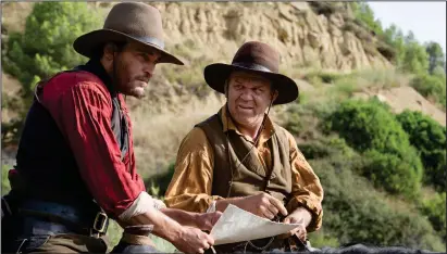  ?? Magali Bragard/Annapurna Pictures ?? Joaquin Phoenix and John C. Reilly in “The Sisters Brothers.”