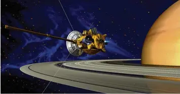  ?? Foto: NASA/DLR/dpa ?? Diese Computergr­afik der NASA zeigt die Raumsonde Cassini am Saturn. Sie soll heute in die Ringe eintauchen und später auf den Planeten stürzen.