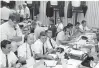  ?? Photo courtesy of Gary W Johnson ?? The NASA photo was taken in the MER during the Apollo 11 mission. Gary Johnson is the one in the dark shirt near the end of the table.