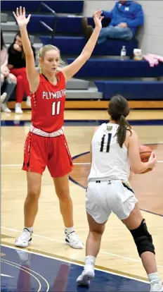  ?? PILOT PHOTO/RON HARAMIA ?? Sara Hunter provides tough defense on New Prairie during the Lady Pilgrims’ opener.