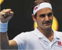  ?? – AFP ?? SIGH OF RELIEF: Roger Federer celebrates his victory over Daniel Evans at the Australian Open in Melbourne.