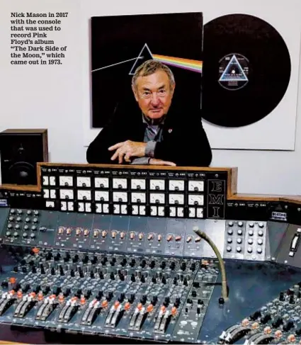  ?? AP ?? Nick Mason in 2017 with the console that was used to record Pink Floyd’s album “The Dark Side of the Moon,” which came out in 1973.
MATT DUNHAM