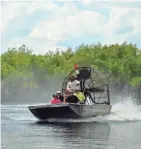  ?? TNS ?? Airboats skim over the Florida Everglades, a vast wetland flowing from Lake Okeechobee south to the tip of Florida’s mainland. Only a fifth lies within the national park where airboats are banned.