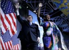  ?? NAM Y. HUH — THE ASSOCIATED PRESS ?? Democratic gubernator­ial candidate J.B. Pritzker, left, and his running mate lt. governor candidate, Juliana Stratton, wave to supporters after Pritzker defeated incumbent Gov. Bruce Rauner in Chicago, Tuesday.