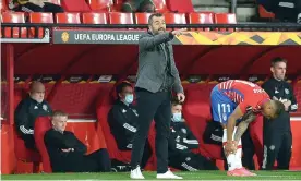  ?? Photograph: Cristina Quicler/AFP/ Getty Images ?? Diego Martínez directs his Granada team against Manchester United, with Ole Gunnar Solskjaer behind him, in the Europa League in April 2021.