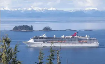  ??  ?? The Carnival Cruise Lines vessel Carnival Spirit enters the Tongass Narrows in Alaska. The Carnival Spirit was scheduled to call in Seattle and Vancouver on its summer voyages, but the pandemic fallout has seen Carnival cancel the year’s remaining cruises to Alaska.