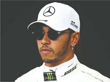  ?? CHARLES COATES/GETTY IMAGES ?? Lewis Hamilton of Britain, Formula One’s first black world champion, spoke out about racial issues on Instagram.