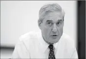  ?? ASSOCIATED PRESS FILE PHOTO ?? SPECIAL COUNSEL ROBERT MUELLER met Wednesday with the leaders of the Senate Intelligen­ce Committee in an effort to ensure their investigat­ions don’t conflict. Mueller is now examining whether President Donald Trump tried to obstruct justice, The...