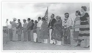  ??  ?? Paul Coze decorating Harrison Begay at the Gallup Inter-tribal Indian Ceremonial, August 1954.(From left to right: M. L. Woodard, P. Coze, H. Begay, J. Herrera, A. Houser, F. Kabotie, J. Kewanwytew­a, Ma-pe-wi, M. Martinez, A. Roanhorse, S. Tafoya, Awa Tsireh, P. Velarde, D. Dunn.) Courtesy M. L. Woodard.