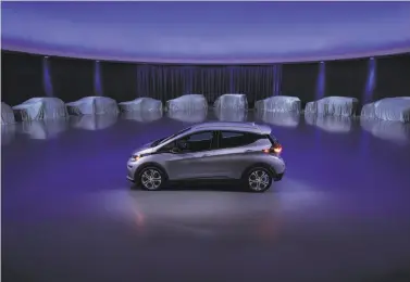  ?? General Motors ?? General Motors’ Chevy Bolt is among the all-electric vehicles recently introduced by automakers.
