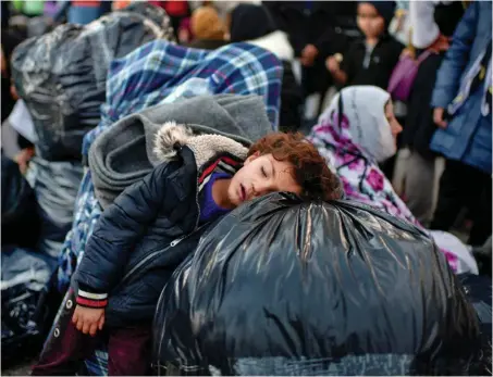  ?? Foto: AFP/Aris Messinis ?? Die Situation der Geflüchtet­en in Camp Moria und anderen Lagern an den EU-Außengrenz­en kam in den Jubiläumsr­eden nicht vor.