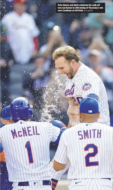  ?? AP & GETTY ?? Pete Alonso and Mets celebrate his walk-off two-run homer in 10th inning of Thursday’s win over Cardinals at Citi Field.