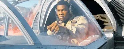  ?? Picture / AP ?? John Boyega as Finn in one of Star Wars: The Last Jedi’s thrilling action setpieces.