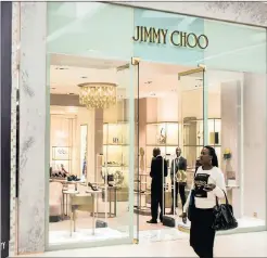  ?? PHOTO: BLOOMBERG ?? Luxury shoemaker Jimmy Choo’s shares shot up at the news of the deal.