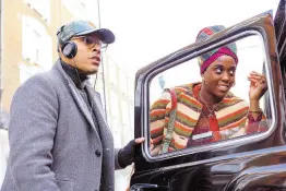  ?? ?? This image released by Paramount Pictures shows director Reinaldo Marcus Green, left, and Lashana Lynch on the set of ‘Bob Marley: One Love’.