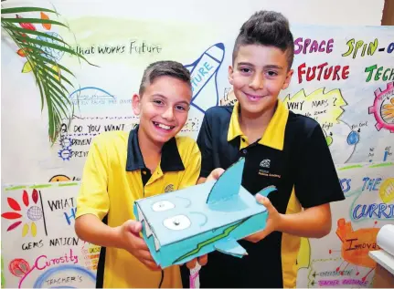 ?? Chris Whiteoak for The National ?? Gems National Academy pupils Jad and Ryan, both 11, at the What Works Future initiative yesterday, part of Dubai’s Knowledge and Human Developmen­t Authority’s overall plan to provide a more complete education.