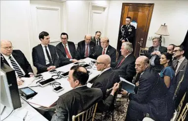  ?? WHITE HOUSE ?? President Donald Trump gets a briefing on the military strike in Syria from his national security team Thursday in Florida.