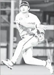  ?? Submitted Photo ?? Razorback freshman second baseman Peyton Stovall (#10) from Haughton, La., charges the ball and throws to first for a put-out against Grambling Tuesday at Baum-Walker Stadium.