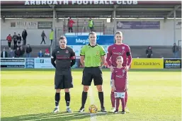  ??  ?? Harri on the Gayfield pitch with Arbroath’s Thomas O’brien, Clyde’s David Goodwillie and referee Greg Aitken.