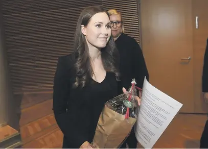  ?? Picture: AFP ?? WOMAN POWER. Sanna Marin of Finland’s Social Democrats is pictured in the country’s capital Helsinki yesterday after she was chosen by the party to the post of prime minister.