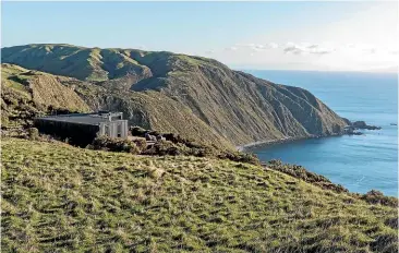  ??  ?? The new luxury retreat is on the outskirts of Wellington, perched on a clifftop overlookin­g Cook Strait.