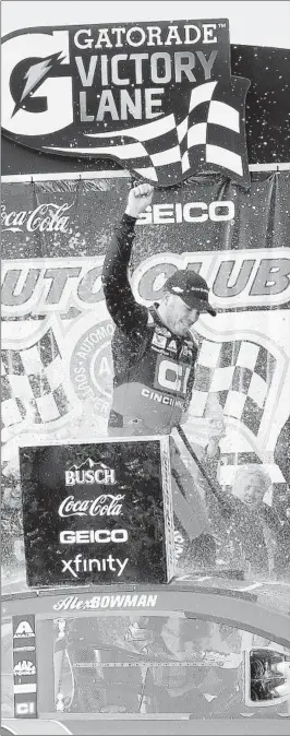  ?? KATELYN MULCAHY/GETTY ?? Alex Bowman celebrates after winning Sunday’s NASCAR Cup race in Fontana, Calif.