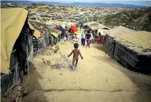  ?? PHOTO: GETTY IMAGES ?? A Rohingya boy makes his way down a path at a refugee camp in Cox’s Bazar, Bangladesh.