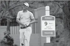  ?? CHRIS CARLSON/AP PHOTO ?? Tom Hoge watches his drive on the ninth hole during the second round of the Wyndham Championsh­ip on Friday in Greensboro, N.C.