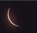  ?? ANDREW NELLES/THE TENNESSEAN ?? The solar eclipse as seen from Fort Donelson National Battlefiel­d in Dover, Tenn., on Monday. Although Middle Tennessee was outside the path of totality, the region experience­d at least 90% coverage of the sun.