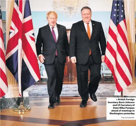  ?? Chip Somodevill­a ?? > British Foreign Secretary Boris Johnson and US Secretary of State Mike Pompeo ahead of meetings in Washington yesterday