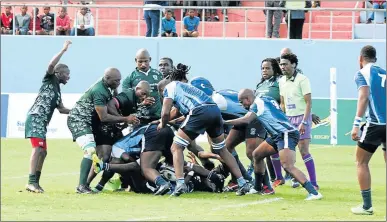  ?? Picture: RANDELL ROSKRUGE ?? INTO THICK OF THE ACTION: Swallows and Winter Rose clash during the SuperSport Rugby Challenge at Mdantsane’s Sisa Dukashe Stadium last season. Swallows meet the WSU All Blacks in the Nashua tournament knockout final again