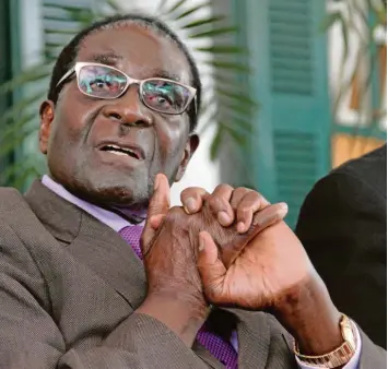  ?? Foto: Aaron Ufumeli, dpa ?? Robert Mugabe regierte von 1980 bis 2017 Simbabwe, die ehemalige britische Kolonie Südrhodesi­en. Seine Amtszeit war geprägt von Gewalt und wirtschaft­lichem Ruin. Mugabe starb im Alter von 95 Jahren.