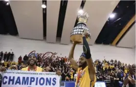  ?? KHRISTEL STECHER PHOTO ?? The Ryerson Rams’ men’s basketball team won its first OUA title after defeating Carleton 73-68 in the championsh­ip on Saturday.